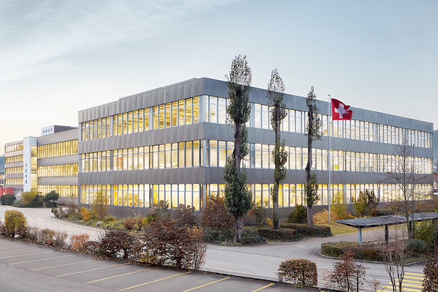 EAO Headquarters main building with Swiss flag (EAO_CO_01_00108)